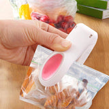 Portable mini heat sealing electric machine.